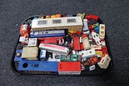 A tray of mid century and later die cast cars and busses, Corgi,