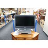 A Sony Bravia 26 inch LCD TV with remote and a Sony VCR