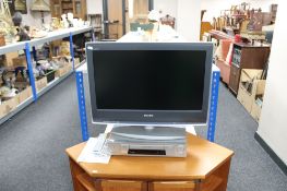 A Sony Bravia 26 inch LCD TV with remote and a Sony VCR