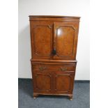 A 20th century walnut cocktail display cabinet