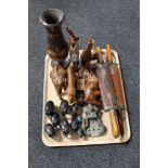 A tray of carved hardwood animal ornaments,