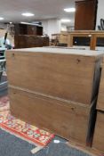 Two plywood storage boxes