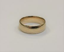 A 9ct gold band ring, size V, 7.3g.