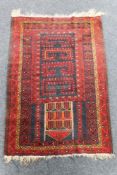 An Afghan prayer rug,