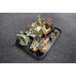 A tray of seven assorted Yare Design pottery dragon ornaments,