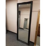 A traditional style black framed mirror,