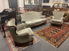 A continental walnut framed salon suite : three seater settee (182 cm wide) and two chairs