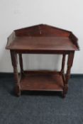 A Victorian painted pine two tier wash stand