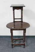 An Edwardian oak pie crust barley twist occasional table together with an oak lamp table on bobbin