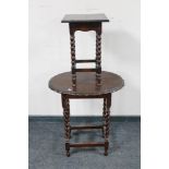 An Edwardian oak pie crust barley twist occasional table together with an oak lamp table on bobbin