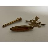 Three gold antique brooches including a hunting horn and West Riding Regiment, 7g.
