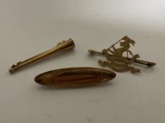 Three gold antique brooches including a hunting horn and West Riding Regiment, 7g.