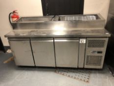 A stainless steel counter serving unit,