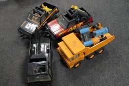 Five tin plate Tonka vehicles to include pick up trucks, dumper truck,