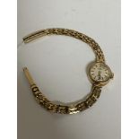 A 9ct gold lady's wrist watch by Rotary, 12.