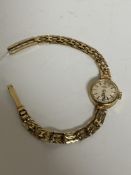 A 9ct gold lady's wrist watch by Rotary, 12.