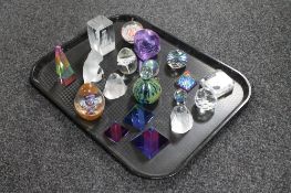 A tray of glass paperweights