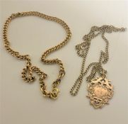 A gold plated necklace with fob together with a further plated watch chain.