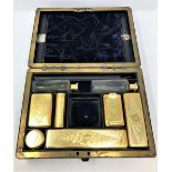 A very fine quality Victorian silver gilt travelling toilet set,