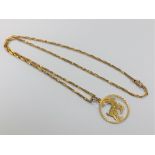 An Arabic yellow gold goat disc pendant on chain CONDITION REPORT: With indistinct
