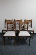 A drop leaf table and five Regency style dining chairs