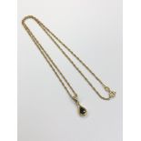 An 18ct gold sapphire pendant on 18ct rope-twist chain
