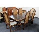 A Barker & Stonehouse Flagstone hardwood dining table on bulbous legs and six high backed dining