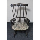 A spindle back rocking armchair
