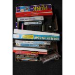 Two boxes of assorted board games, card games, children's books,