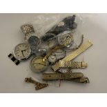 A bag of wristwatches and pocket watches