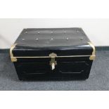 An early 20th century hand painted tin trunk