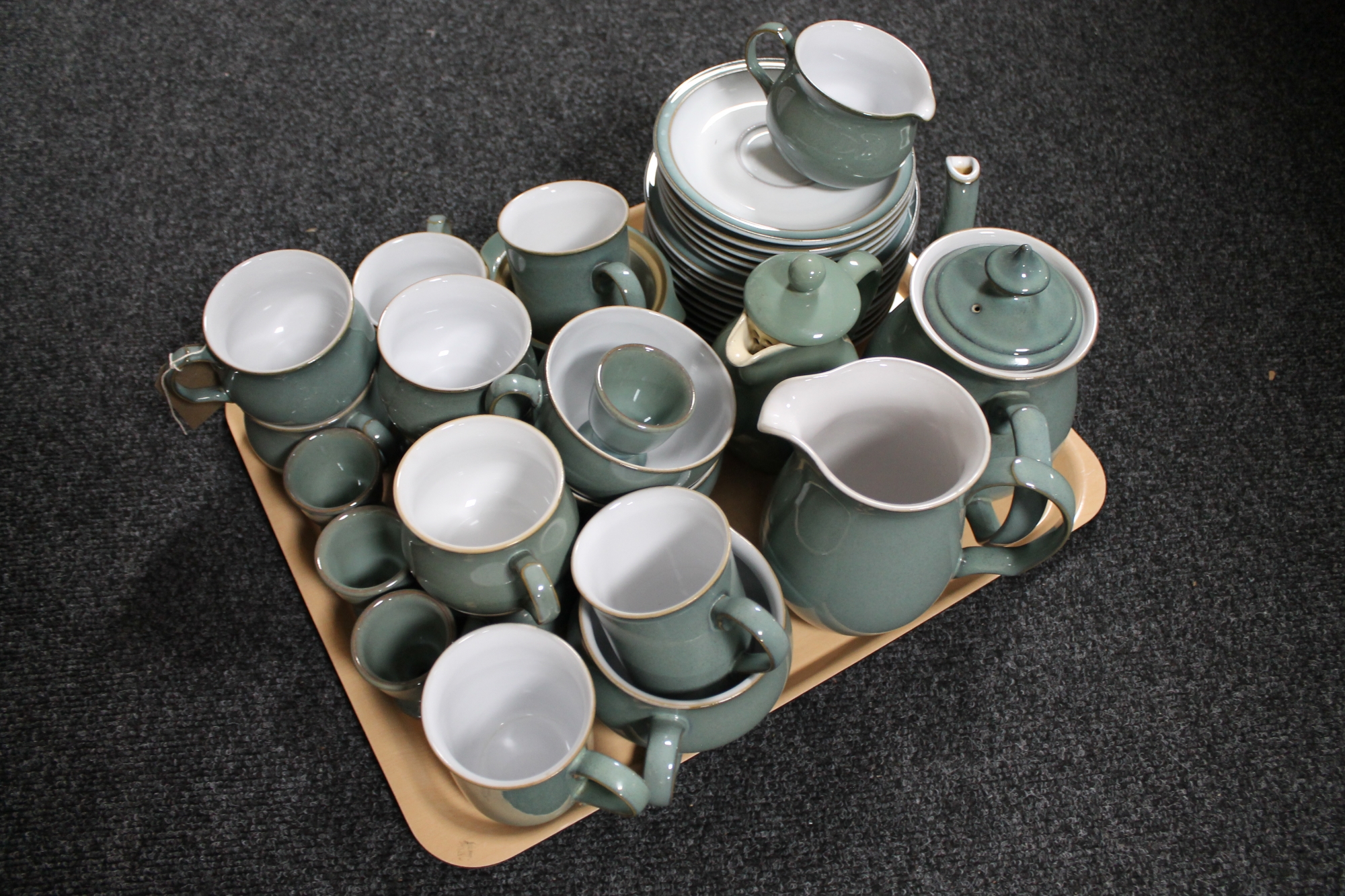 Approximately sixty-six pieces of Denby tea and dinner ware