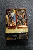 Three tins of woodworking tools,