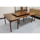 A late 19th century mahogany D-end dining table with leaf