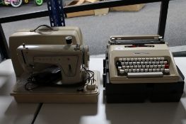 A cased Olivetti Lettera 35 type writer,