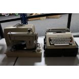 A cased Olivetti Lettera 35 type writer,