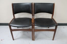 A pair of mid 20th century Danish teak dining chairs