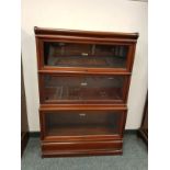 A three tier Globe-Wernicke stacking bookcase,