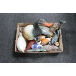 A box of assorted duck ornaments