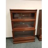 A three tier Globe-Wernicke stacking bookcase,