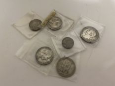 A collection of coins - 1898 shilling, 1887 sixpence, 1 guilders 1848, 1866 and 1849, 2 kroner 1904.