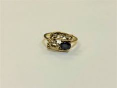 An 18ct gold sapphire and diamond set ring, size N/O, 3.7g.