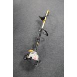 A Ryobi petrol strimmer