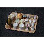 A tray of collection of china eggs and trinket boxes, china flower posy,