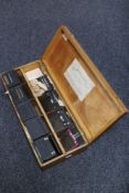 An antique slide box containing glass negatives of industrial interest,