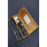 An antique slide box containing glass negatives of industrial interest,