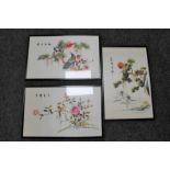 Three framed Chinese embroidered silk panels depicting birds in foliage