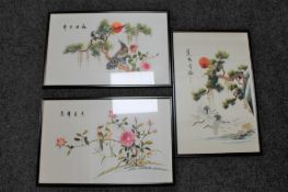 Three framed Chinese embroidered silk panels depicting birds in foliage