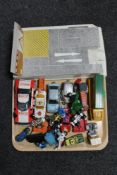 A tray of mid century and later die cast vehicle including Burago, matchbox,