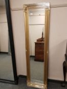 A traditional gilded style mirror,